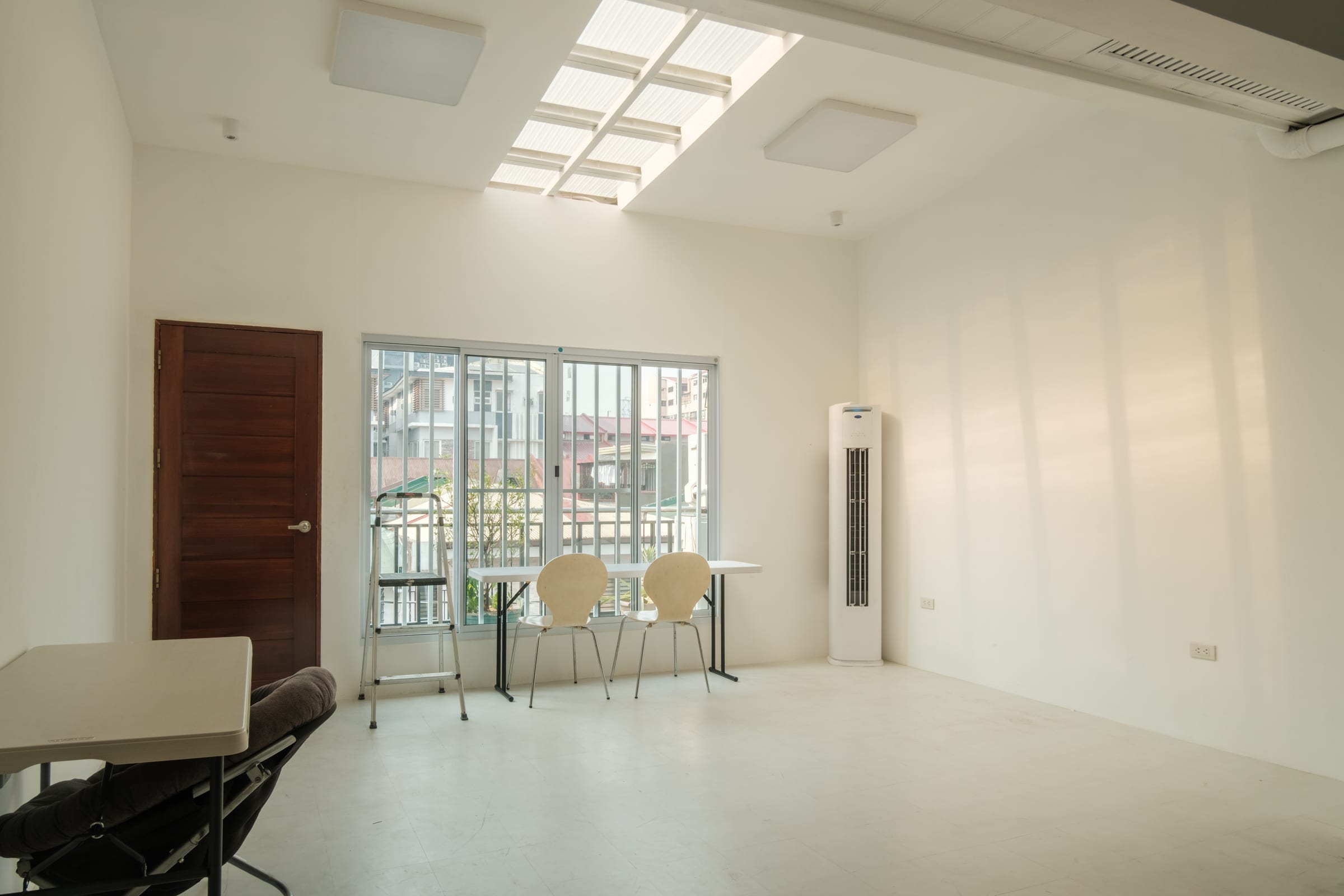 Main studio — open-plan shooting space with window light